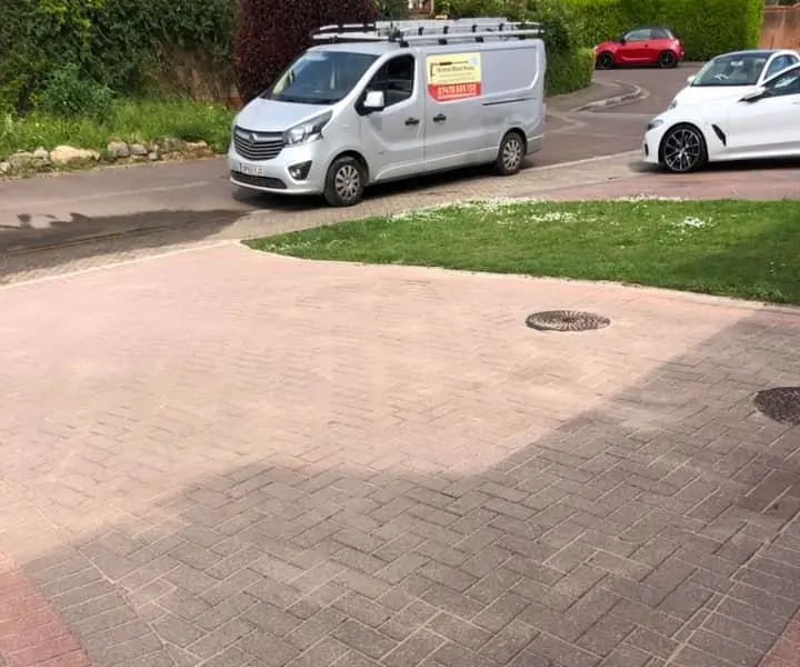 The result of a driveway cleaned for a client in North Bristol by our team