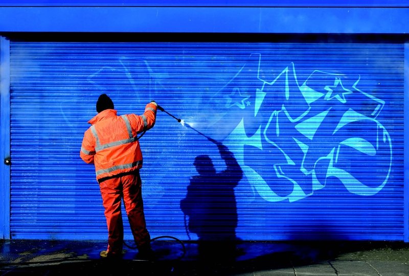Why removing graffiti from brick walls requires attention