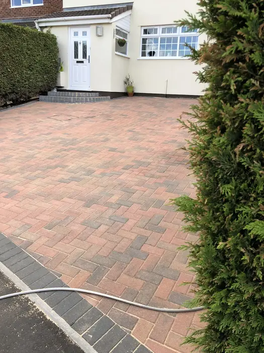 Restored block paving driveway after professional jet washing and re-sanding service by Bristol Blast Away in Clifton