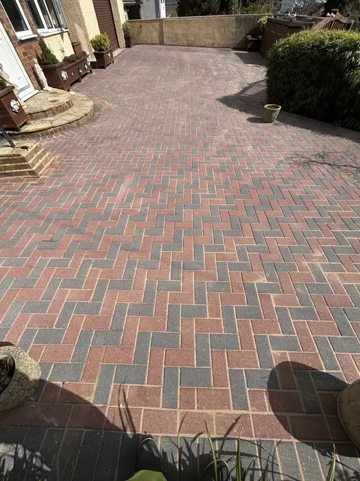 Restored block paving driveway after professional jet washing and re-sanding service by Bristol Blast Away in Stockwood